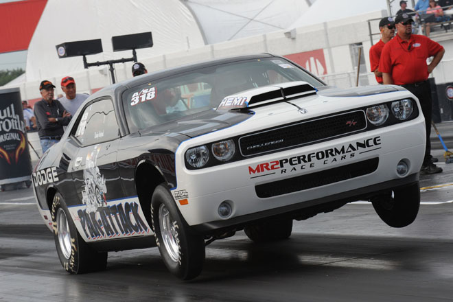 "Big Daddy" Don Garlits drives his Mopar Dodge Challenger Drag P